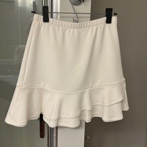 White skirt with bottom ruffle detail